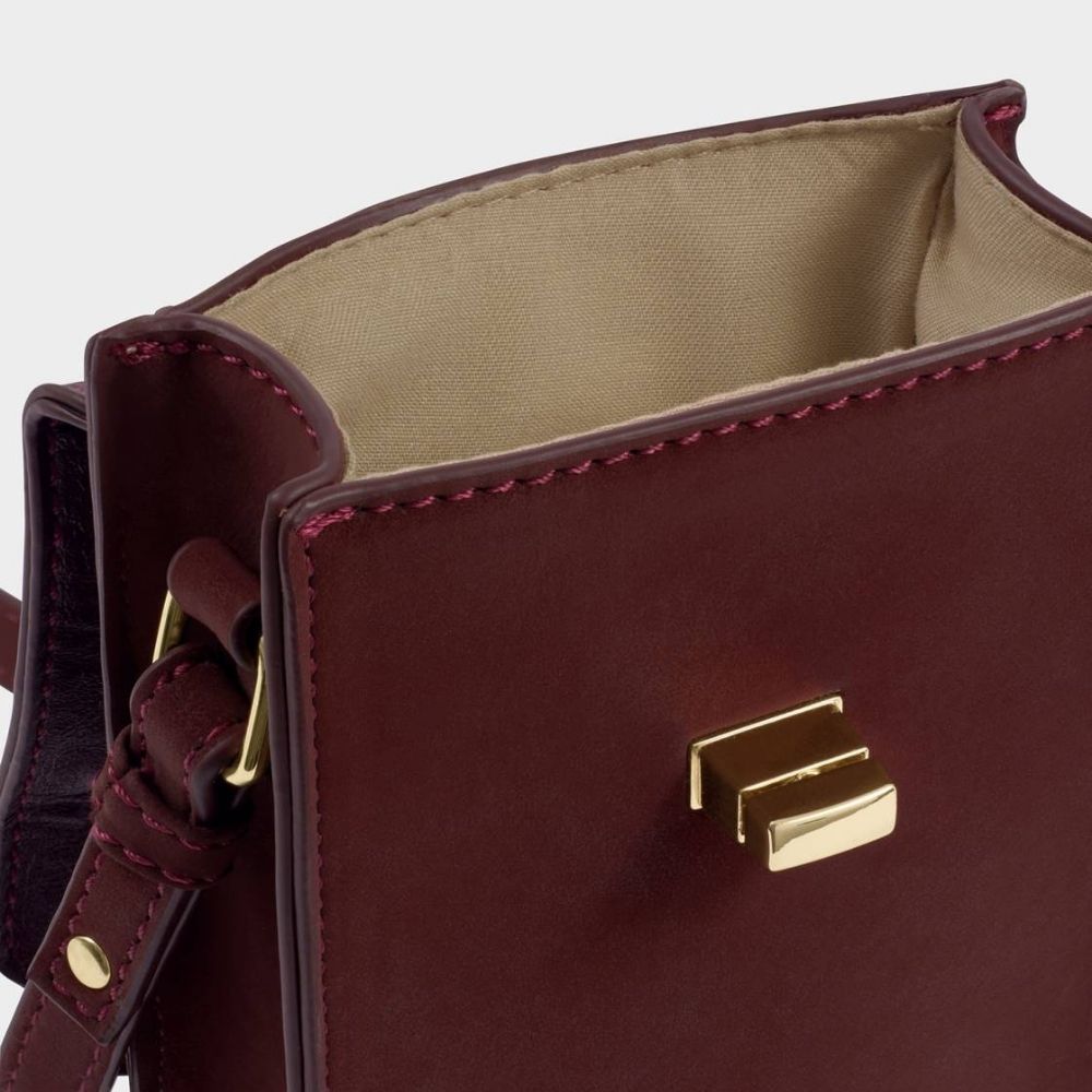 Katie Loxton Orin Twist Lock Suedette Slim Bag - Cherry