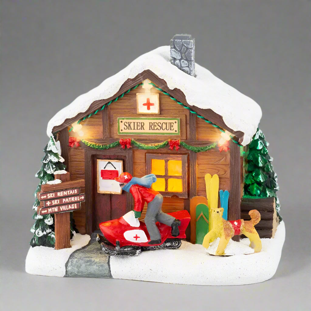 Lumineo 14cm Christmas Village Ski Rescue Hut Scene - Battery Operated