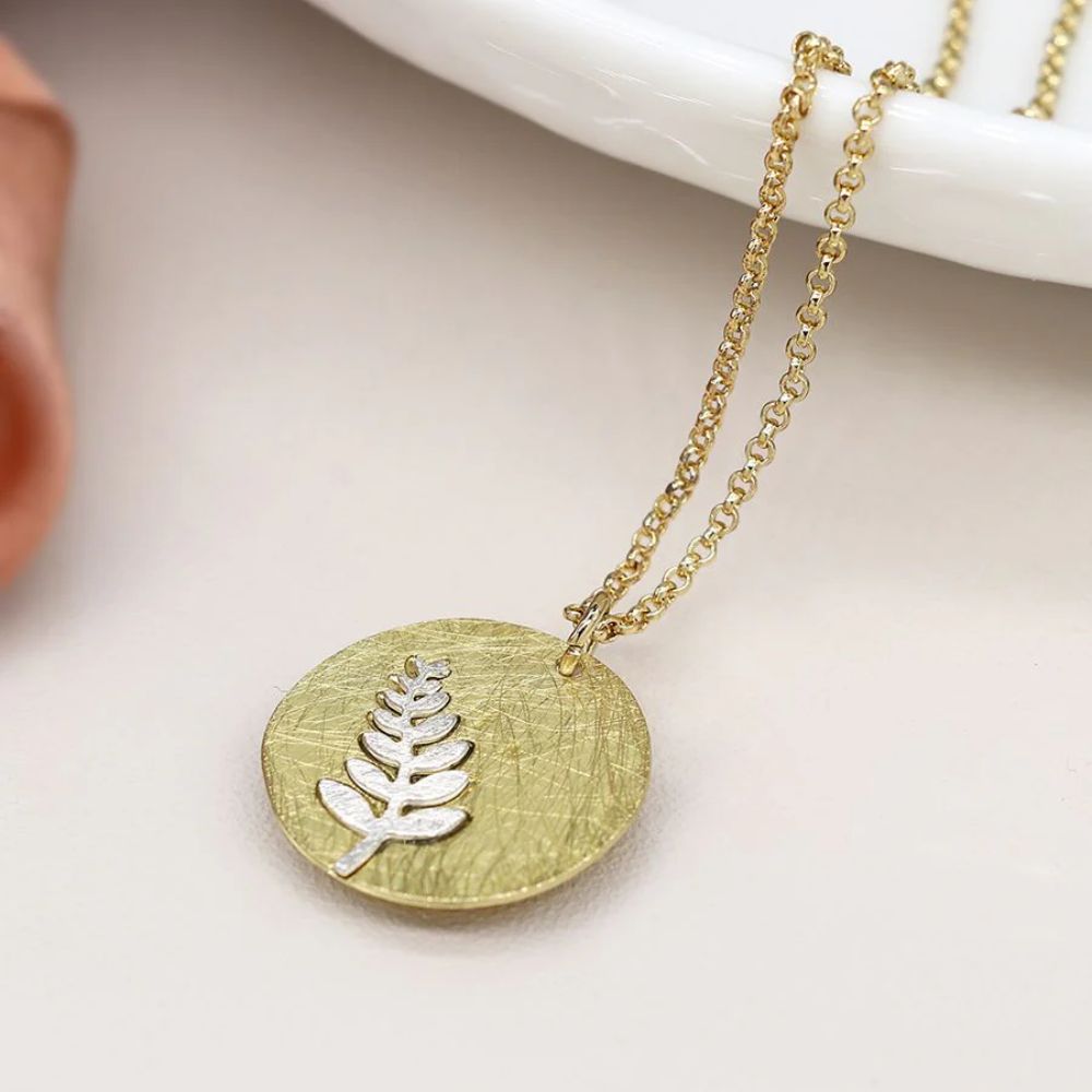 POM Brushed Faux Gold Disk with Silver Fern Necklace