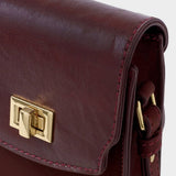 Katie Loxton Orin Twist Lock Suedette Slim Bag - Cherry