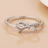 POM White Gold Plated Asymmetric Crystal Bow Ring (Small-Medium)