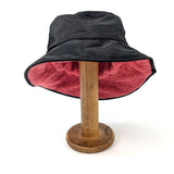 Black Ginger Showerproof Hat with Teddy Bear Lining - Dark Pink