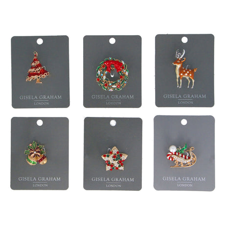 A collection of six Gisela Graham Diamante Metal Festive Brooches, each with a different festive design, displayed on grey cards.