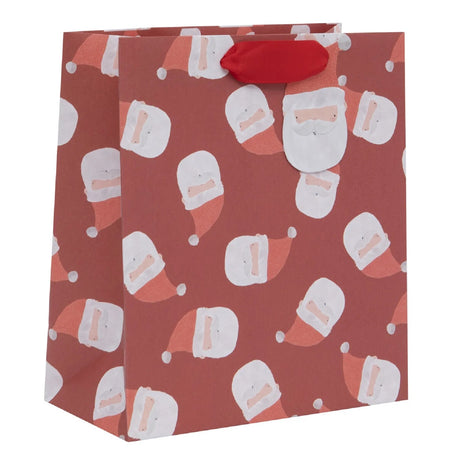Gift bag with Santa Claus pattern on a red background
