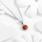 Henryka Round Charm Necklace in Silver & Cognac Amber