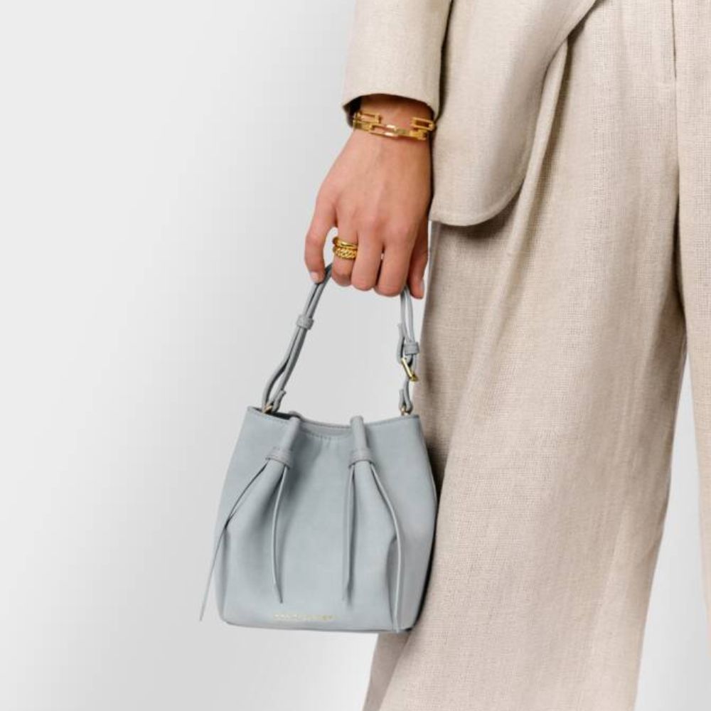 Katie Loxton Blue Celina Mini Suedette Bucket Bag - Old Railway Line Garden Centre