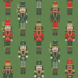 Pattern of colorful nutcrackers on a green background