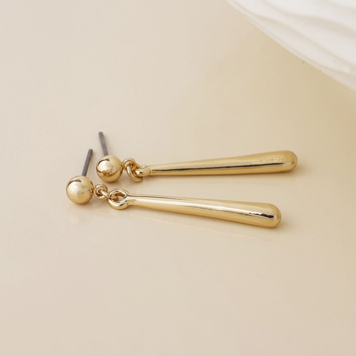 POM Cassia Golden Smooth Bar Drop Earrings
