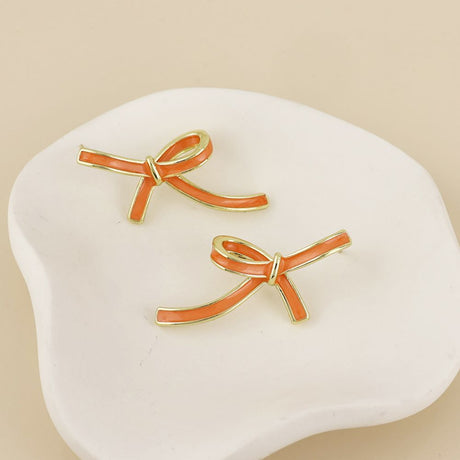 POM Seraphina Stainless Steel Gold Plated Orange Enamel Bow Earrings