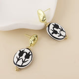 POM Sylvie Stainless Steel Gold Plated Pebble and Monochrome Tulip Earrings