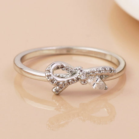 POM White Gold Plated Asymmetric Crystal Bow Ring (Medium-Large) - Old Railway Line Garden Centre