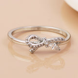POM White Gold Plated Asymmetric Crystal Bow Ring (Small-Medium) - Old Railway Line Garden Centre