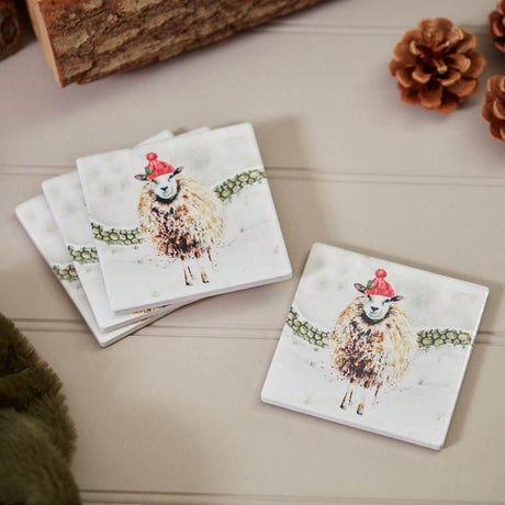 Set of coasters with sheep illustrations on a wooden surface