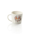 White mug with floral design on a white background