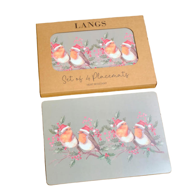 Set of 4 placemats with Christmas design in a 'Langs' box on a wooden surface.
