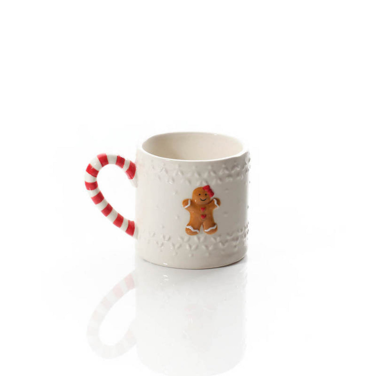 White mug with red handle and gingerbread man design on a white background