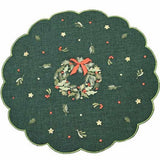 Decorative green mat with a Christmas wreath design on a white background